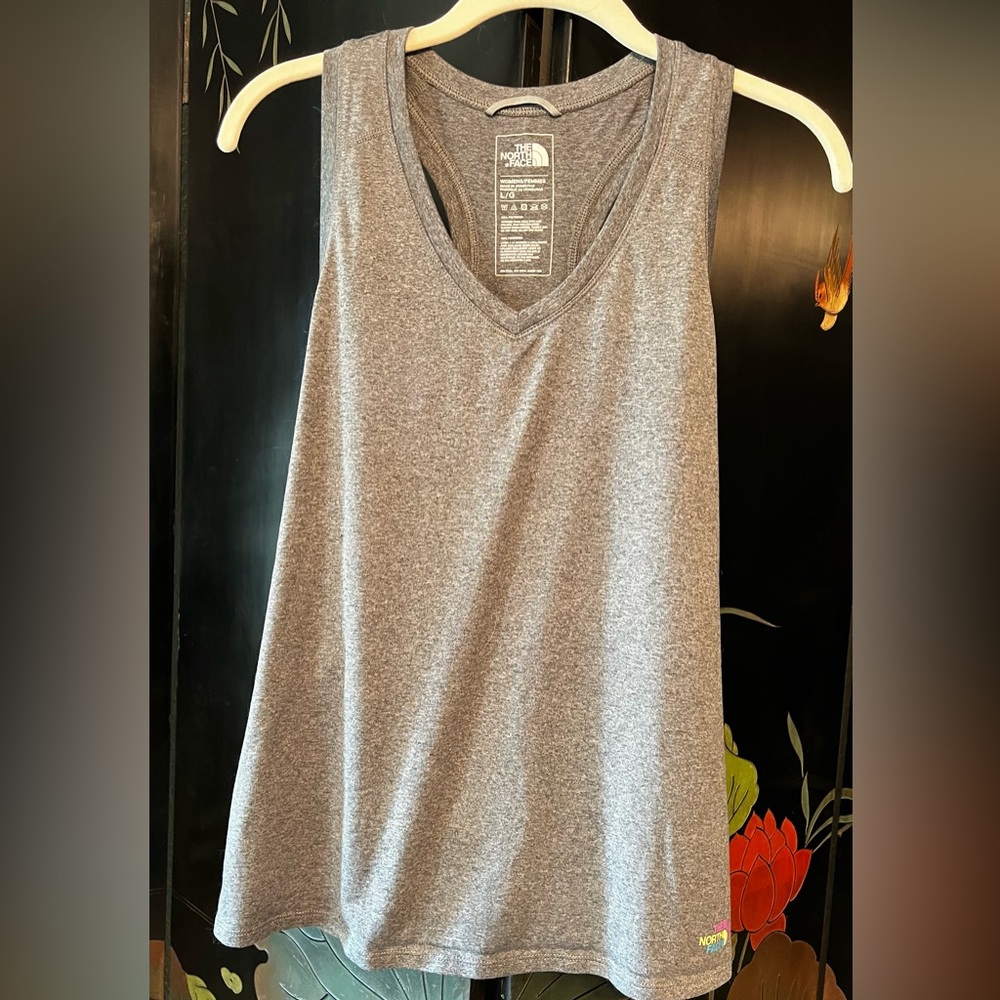 The North Face racer back tank for women. Excellent NWOT at the lowest price🔥